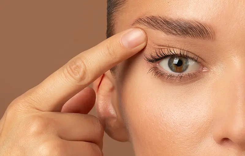 Perfect slim toned young body of brunette sensual girl, fit woman at studio. The fitness, diet, sports, plastic surgery and aesthetic cosmetology concept. Long legs.