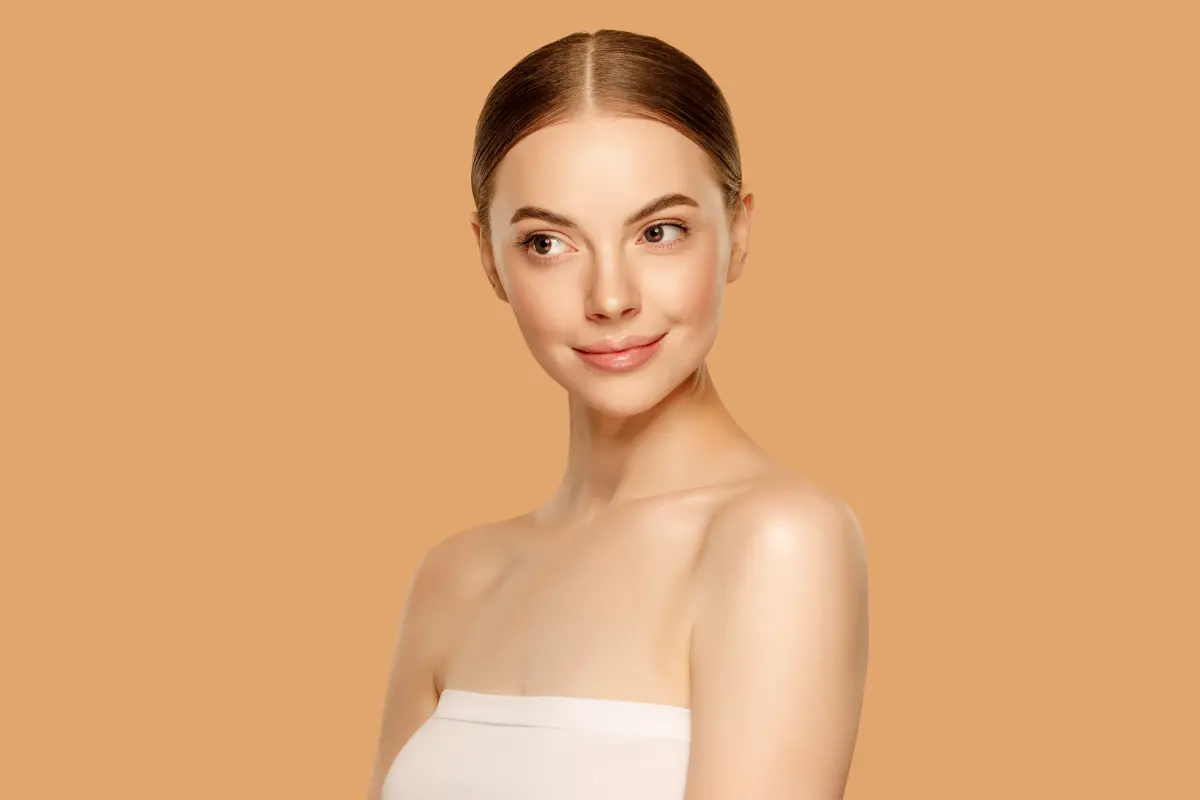 Perfect slim toned young body of brunette sensual girl, fit woman at studio. The fitness, diet, sports, plastic surgery and aesthetic cosmetology concept. Long legs.