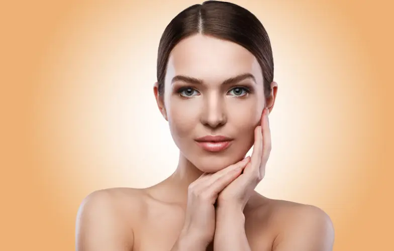 Perfect slim toned young body of brunette sensual girl, fit woman at studio. The fitness, diet, sports, plastic surgery and aesthetic cosmetology concept. Long legs.