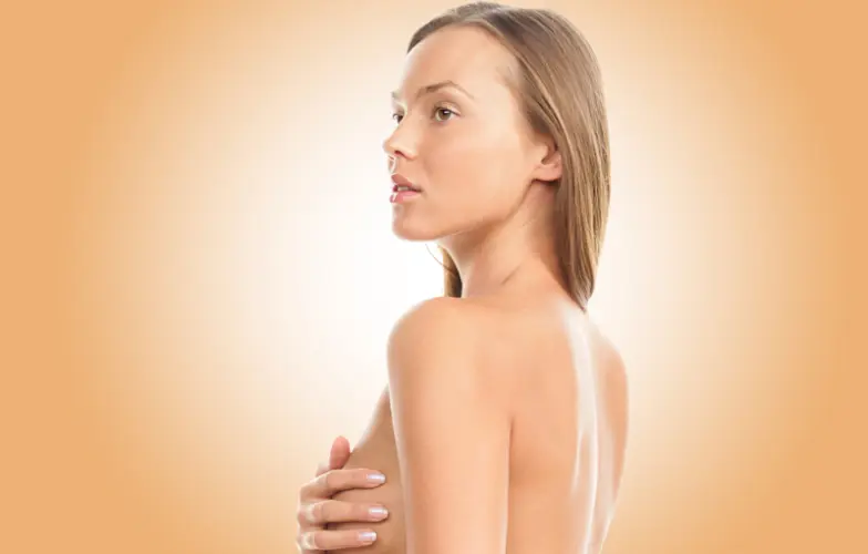 Perfect slim toned young body of brunette sensual girl, fit woman at studio. The fitness, diet, sports, plastic surgery and aesthetic cosmetology concept. Long legs.